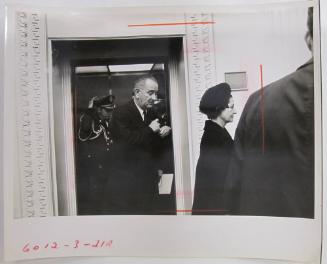 Lyndon and Lady Bird Johnson Exiting an Elevator