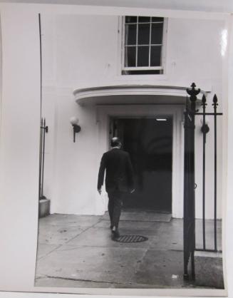 Rear View of Man Walking into White House