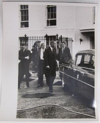 Lyndon Johnson with a Group of Men Behind White House