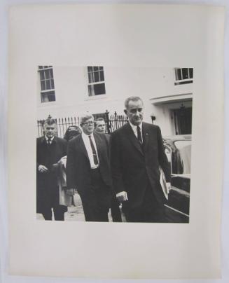 Lyndon Johnson with a Group of Men Behind the White House