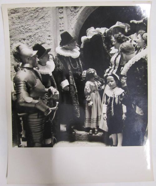 Group in Traditional Dress Drink from Beerstein