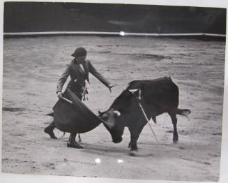 Conchita Cintron Facing a Bull with a Sword Beneath her Cape