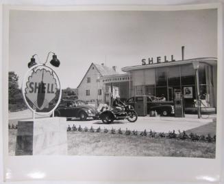 Busy Scene at Shell Gas Station