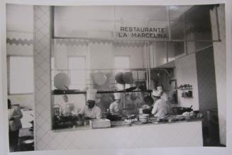 Cooks Prepare Food at The Restaurante La Marcelina
