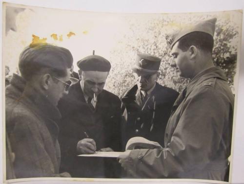 Man Signs Document