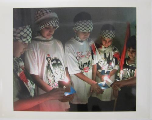 Palestinian Children Light Candles