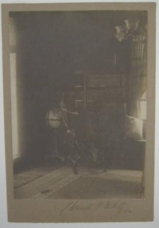 Warren S. Weiant, Jr. (Looking at Globe)