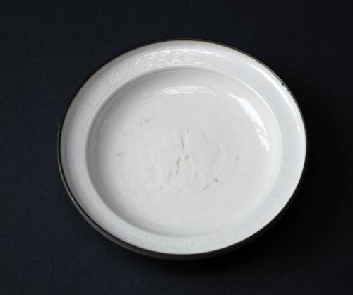 Dish (imitating Dingware of the Song dynasty with molded design of carp)