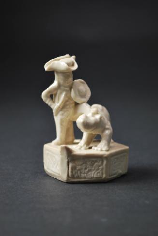 European figure with mythical creature