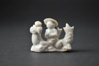 European figure with mythical creature