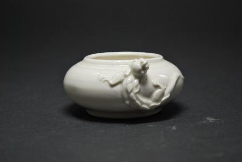 Brush washer with mythical creature