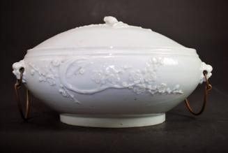 Covered tureen with metal loop handles
