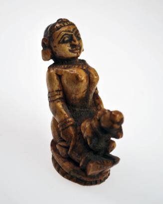 Seated Female (Deity?) with Child