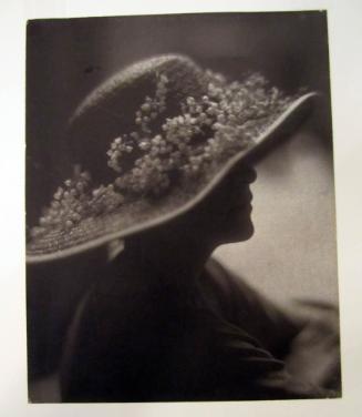 Silhouette of Woman in Flowered Hat