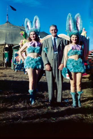 2 Ladies in Bunny Costumes with Circus Fan