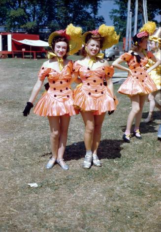 Color Slide of 2 ladies in peach colored costumes