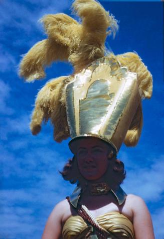 Female Performer in Feathered Headdress