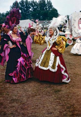 2 Ladies in Spec Costumes