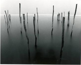 Michael Kenna, British, born 1953, Docking Poles, Venice, Italy, 1980, Gelatin silver print, Gi…