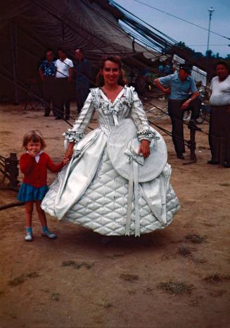 Female Performer in White Costume