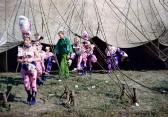 Group in pink, white & blue costumes