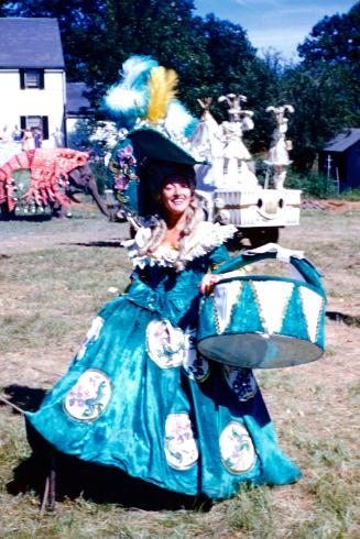 Lady in blue and white costume