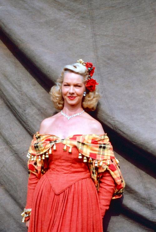Pat Reed in red costume