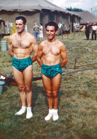 2 Male Performers in turquoise garb