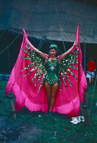 Miss Mara in pink and green garb in BY