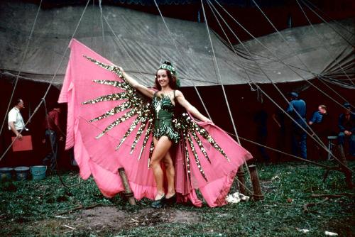 Lady in pink and green garb in BY