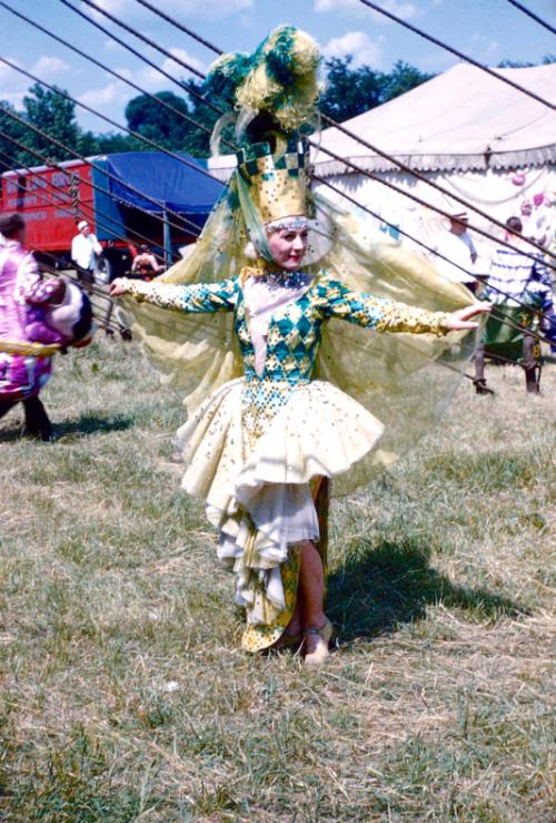 Yvette Zenner Kohl in yellow/green checkered costume with headpiece