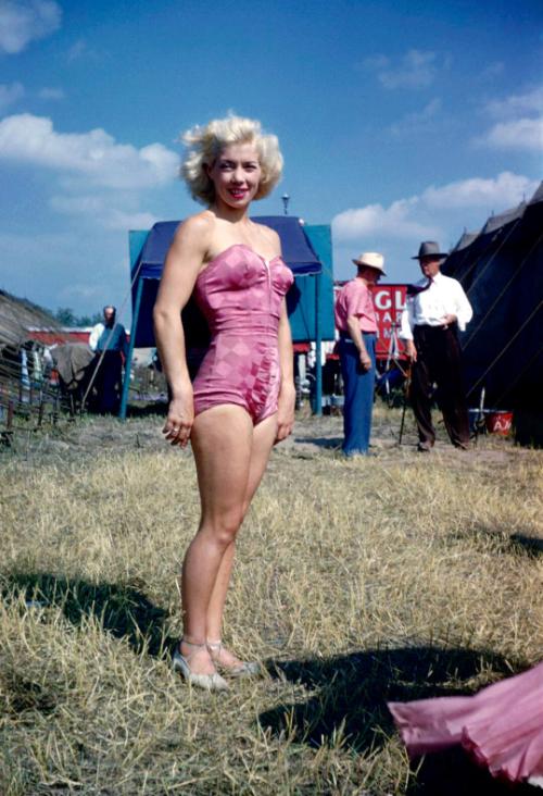 Lady in pink garb in BY
