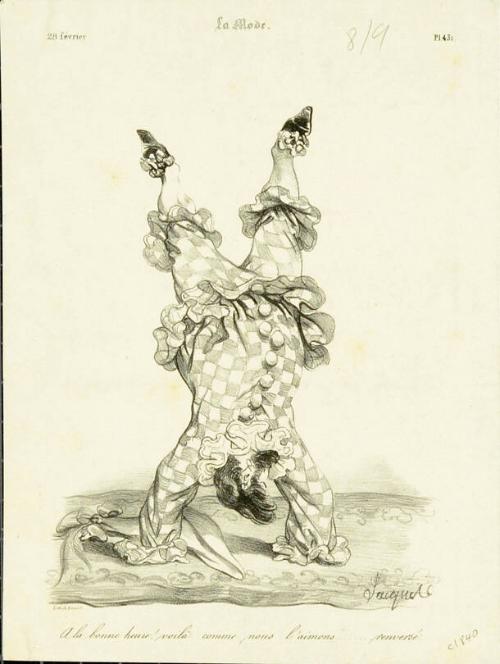 Female clown doing handstand