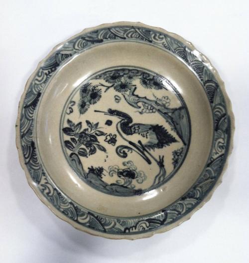 Blue and white plate with waterfowl and pine