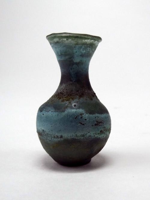Small opaque blue and green vase